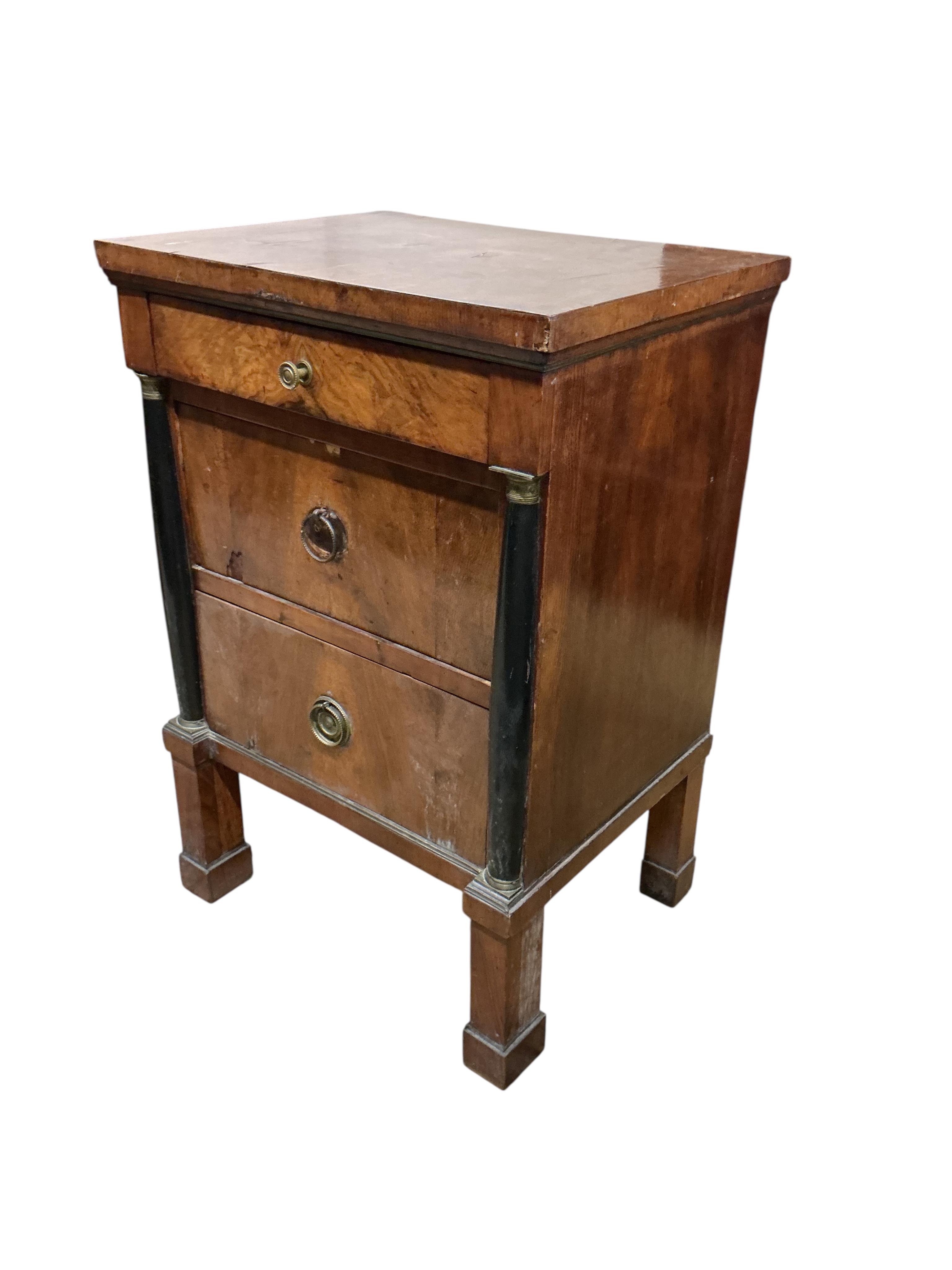 A 19th century Biedermeir style part ebonised walnut narrow commode, width 47cm, depth 44cm, height 84cm